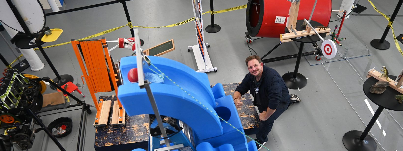 Zach with the machine he built at SEE