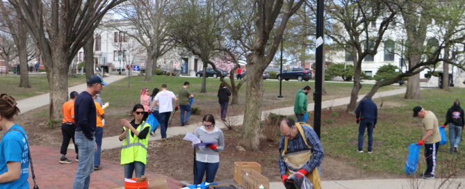Volunteers clean a park in Manchester