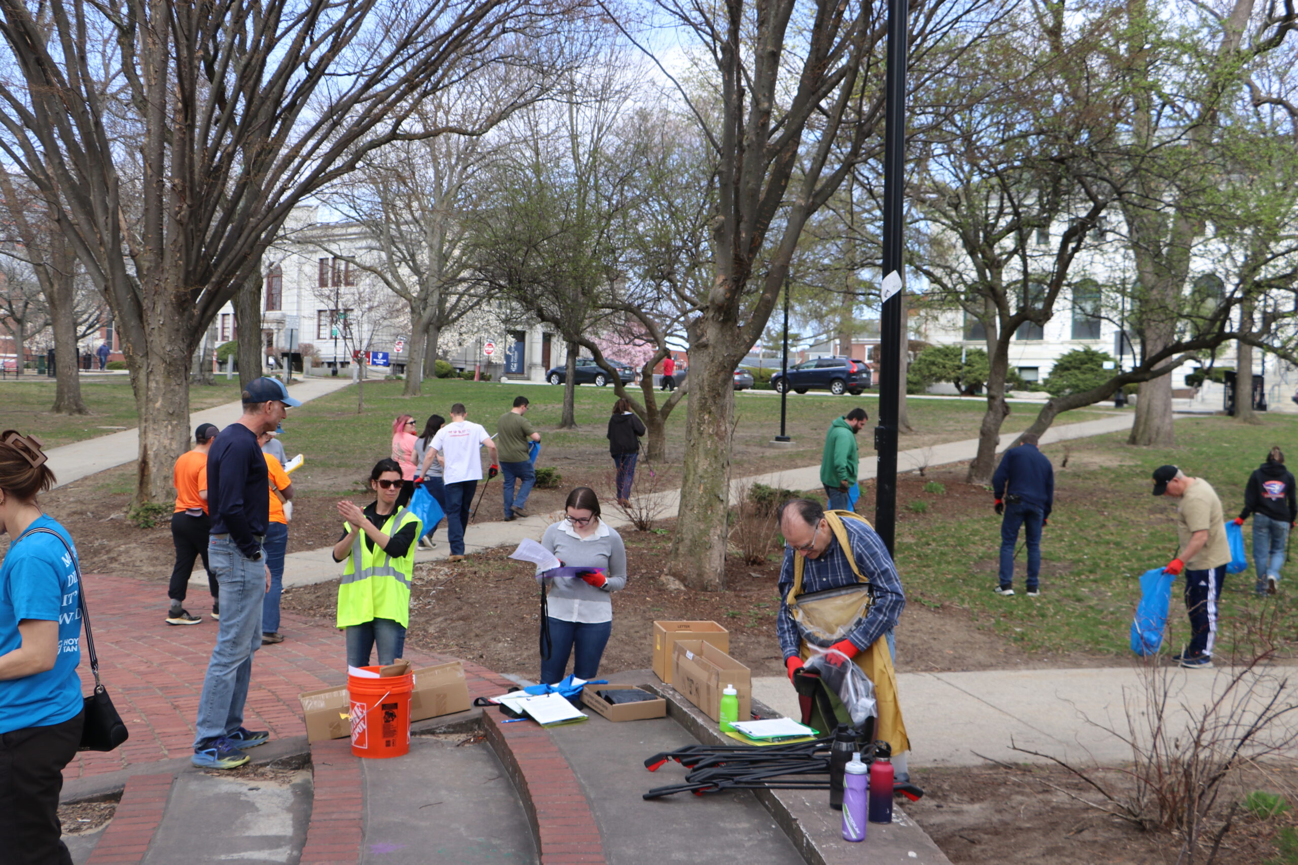 Volunteers clean a park in Manchester