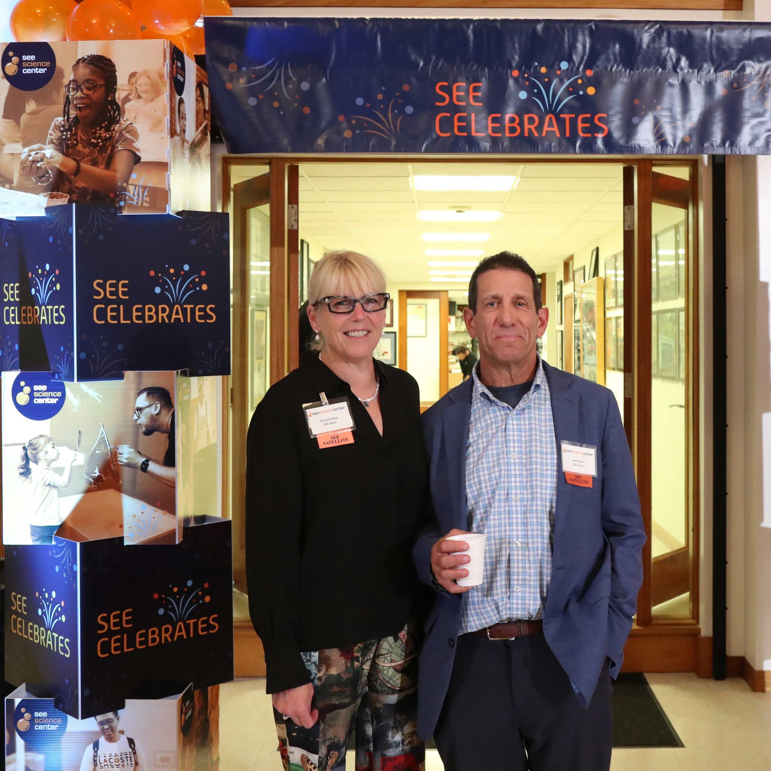 Donors posing for photos at SEE Celebrates